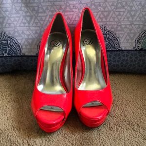 Neon hot pink pumps